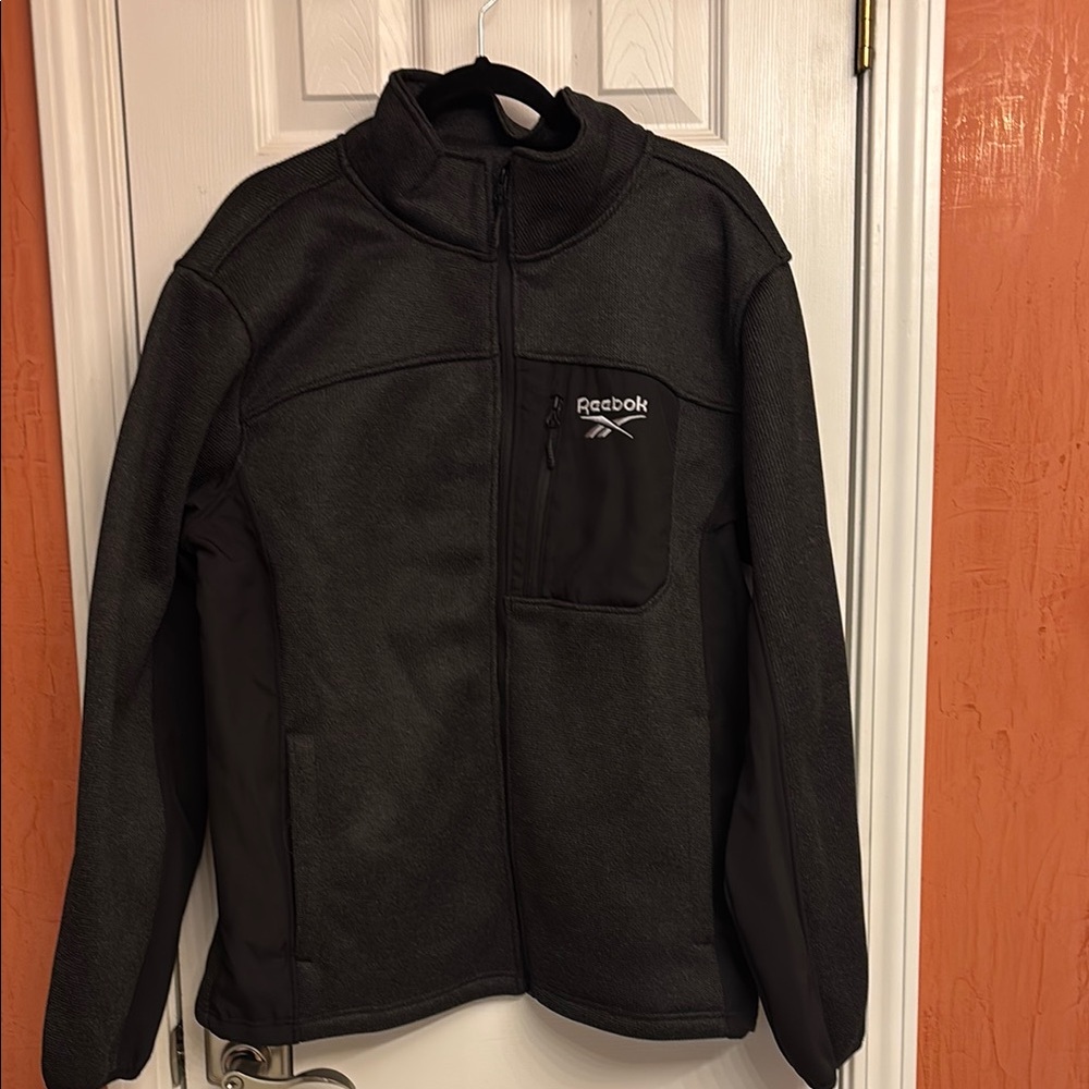 Reebok Black Performance Jacket with High Collar and Zip-Up Style